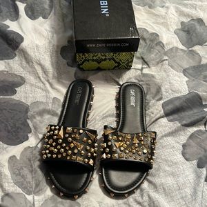 Black and gold sandals